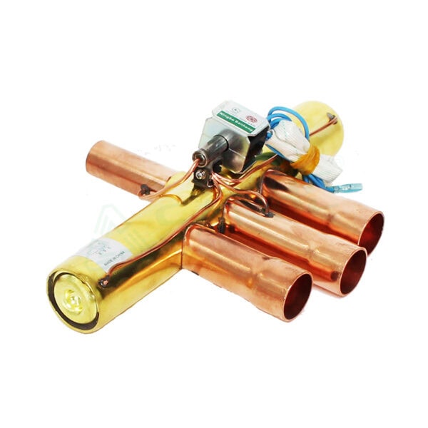 Close-up of HVAC compressor component with copper pipes and electrical connections, used in heating, ventilation, and air conditioning systems.